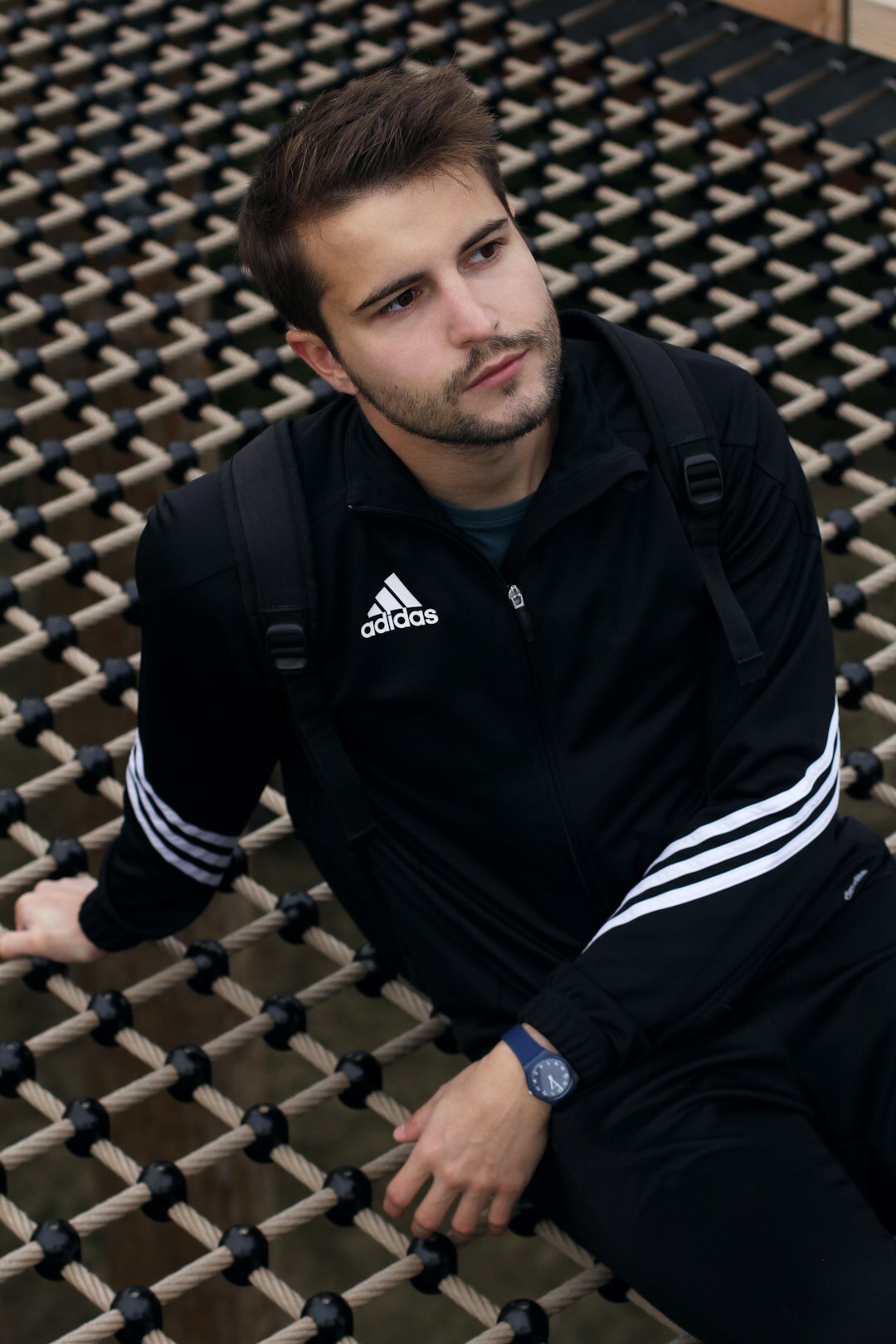 Studio portrait of a young Slovenian male media communications coach